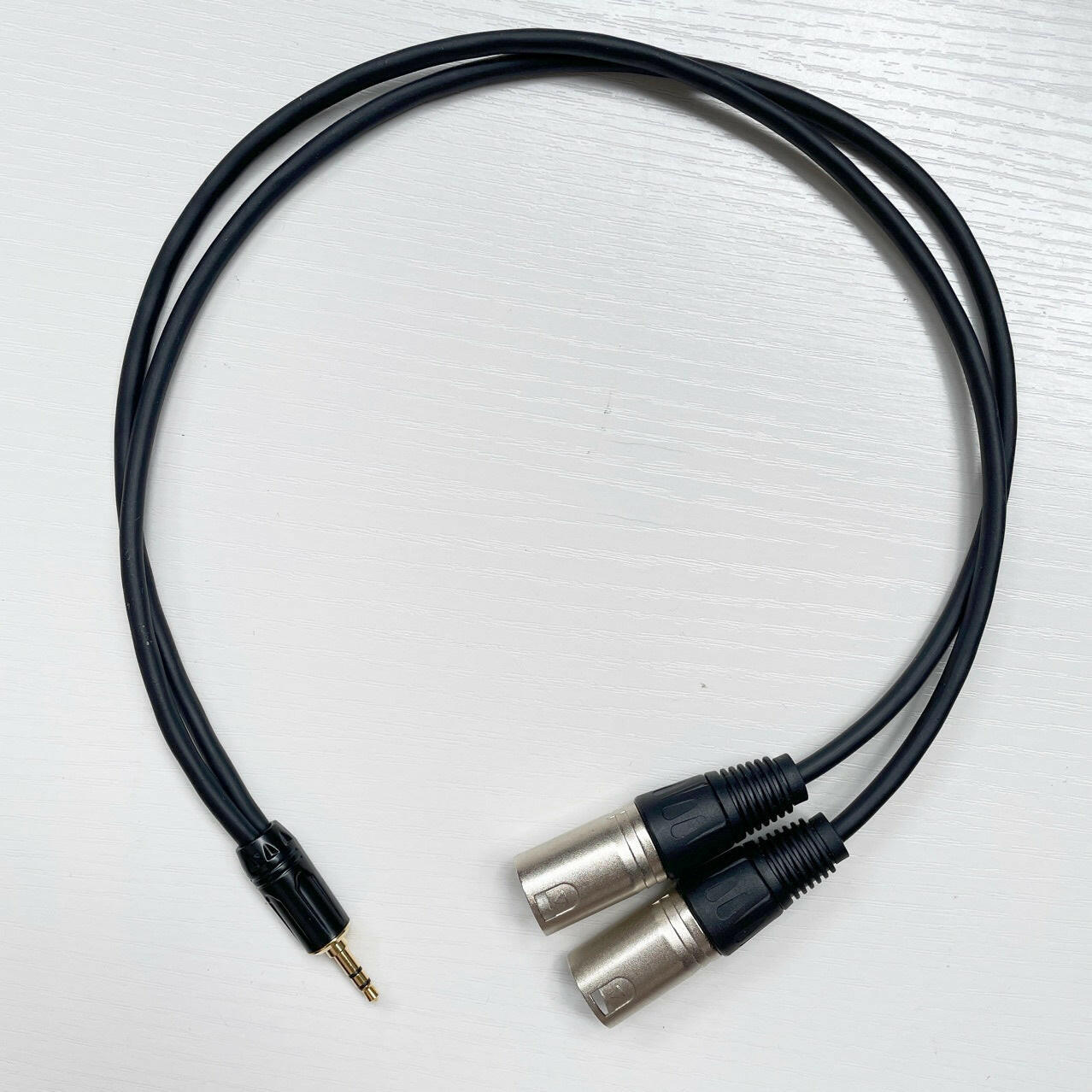 . 3.5mm to Dual XLR Audio Cable – Bare Copper, Black Sheath - GoTypical